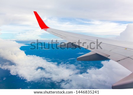 Morning sunrise with Wing of an airplane. Photo applied to tourism operators and fast and efficient transportation. picture for add text message or art work frame website. Traveling concept.
