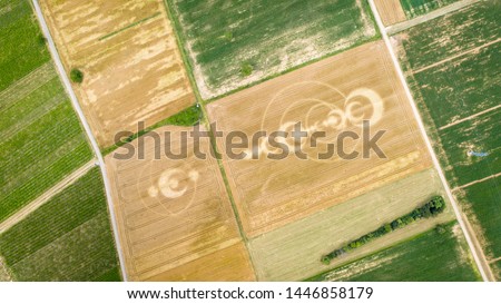 An image of crop circles field Alsace France Royalty-Free Stock Photo #1446858179