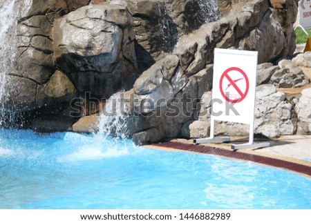 Prohibition plate jump from the pool to the pool in the water park