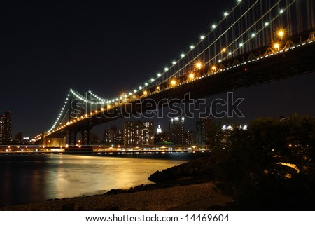 Manhattan Bridge and skyline at dusk from Brooklyn - New York City, USA