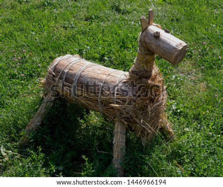 Wooden toy dogs, reminiscent of toys of the nineteenth century.