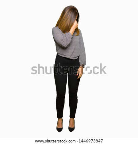 Beautiful middle age business woman tired rubbing nose and eyes feeling fatigue and headache. Stress and frustration concept.