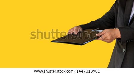 Business woman handed document file to customer isolated on yellow banner background with copy space