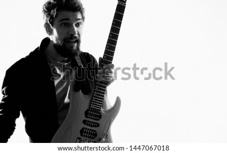 A man with a guitar entertainment program of modern music