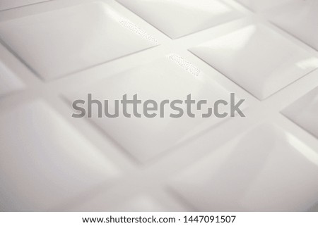 Copyspace White Papers Background Mock-up for adv. Selective focus glossy surface. Extreme Close up