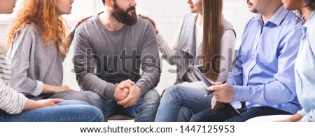 Rehab group meeting. Women comforting stressed man at support therapy, panorama Royalty-Free Stock Photo #1447125953