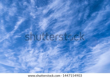 Fluffy clouds on blue sky, natural background concept
