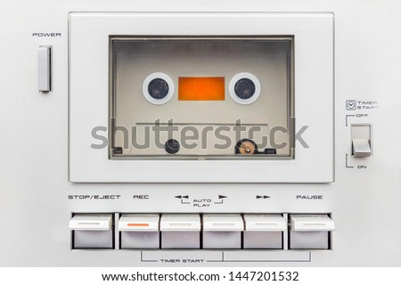 Close up of a vintage silver audio cassette player with buttons Royalty-Free Stock Photo #1447201532