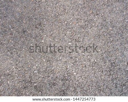 Asphalt detail texture. Road surface close up photo.