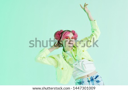 woman with pink hair neon light studio