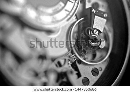 Black and white image of watch movement 