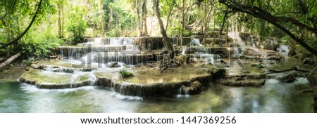 Huai Mae Khamin Waterfall in tropical rainforest with rock and turquoise blue pond has 7 tiers, Seven leveled falls are one of most beautiful waterfalls in Thailand. Khuean Srinagarindra National Park