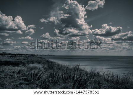 the coast of the Sea of Azov, the clouds float in the sky