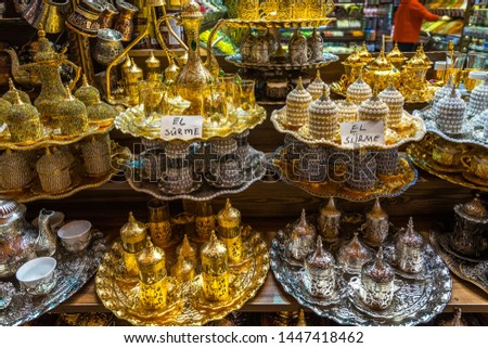 Typical tea sets with teapots and tea glasses for sale on sale at at Istanbul Spice Bazaar (Egyptian Bazaar), Turkey,