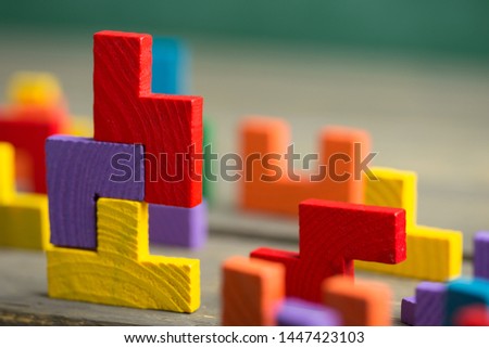 Creative solution for idea - business concept, jigsaw puzzle on the green blackboard background Royalty-Free Stock Photo #1447423103