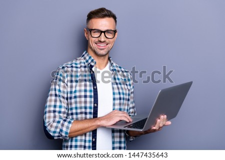 Close up photo handsome attractive he him his cheer guy hands arms hold notebook writing checking letters colleagues partners stylish look wear casual plaid checkered shirt isolated grey background