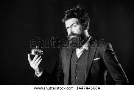 Secret under cloche. Elite luxurious. Exclusive food hidden cloche. Here is your meal. Something special. Man well groomed bearded gentleman formal suit hold little cloche. Serving and presentation.