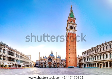 Sunrise in San Marco square with Campanile and San Marco's Basilica. Panorama of the main square of the Old town. Venice, Veneto, Italy. Royalty-Free Stock Photo #1447470821
