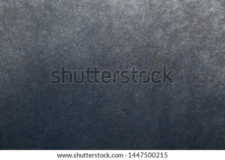 abstract gray background of fleecy fabric, dark textile gradient backdrop