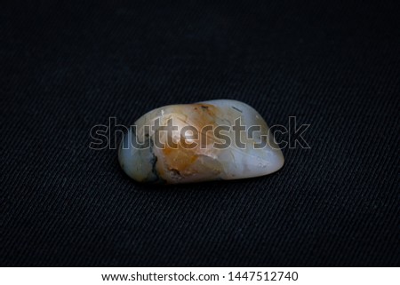 Rare white black and orange kind of jasper gemstone found in european mountains