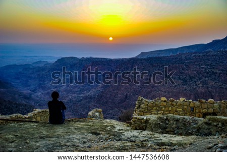 Jordan, view over the canyon of the Dana Biosphere Reserve during sunset. Royalty-Free Stock Photo #1447536608
