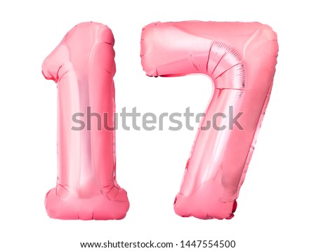 Number 17 seventeen made of rose gold inflatable balloons isolated on white background. Pink helium balloons forming seventeen number Royalty-Free Stock Photo #1447554500