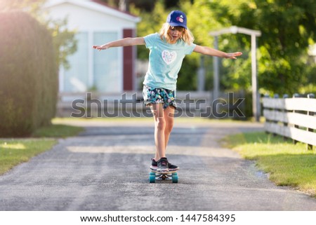 Little girl with a skateboard