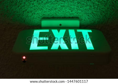 Exit sign at night Escape dark emergency moody