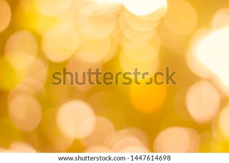 Blurred christmas tree lights on background. Design effect focus happy holiday party glow texture white wall paper bokeh sun sunny star shiny soft plain warm flare blur night light orange new year.