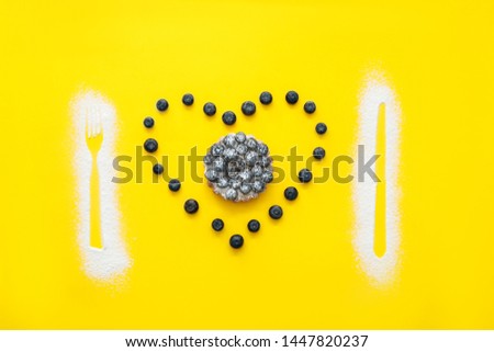 Composition with tasty blueberry tart on color background