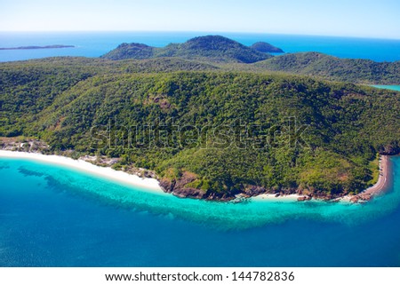 Whitsunday Island aerial with fringing reef