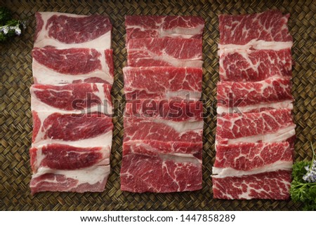 thinly sliced fresh beef is grilled