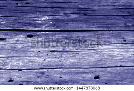 Old grunge wooden fence pattern in blue tone. Abstract background and texture for design.