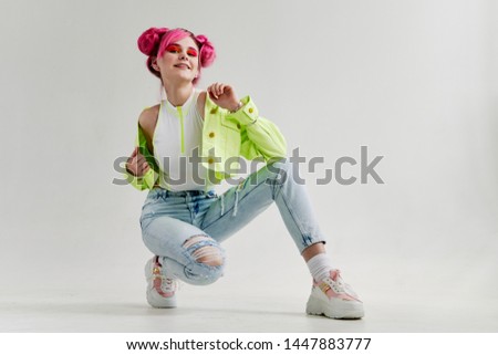 woman with pink hair in stylish clothes