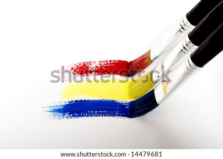 Brushes painting rainbow