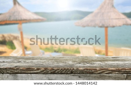 Empty wooden table background for display montages