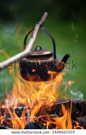Coffee pot on camping fire