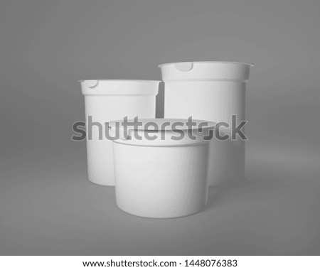 White plastic containers for dairy foods with foil lid on gray. 3D render