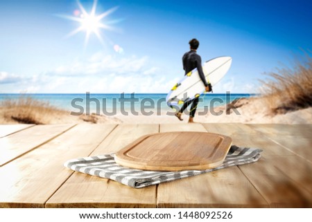 Wooden desk of free space and summer beach landscape 