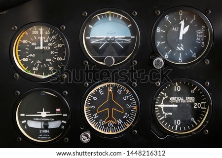 Classic small airplane six pack instruments Royalty-Free Stock Photo #1448216312