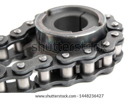 Roller chain and drive sprocket on a white background