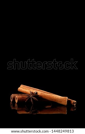 Cinnamon sticks on black background. Cinnamon sticks isolated on the black.