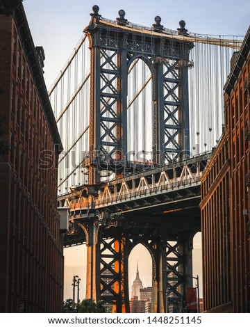 Incredible view of the Manhattan bridge from Dumbo Brooklyn New York during a gorgeous sunset on Washington St