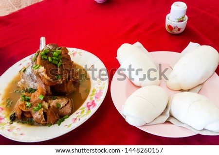 Herb stewed pork legs and mantou are famous dishes of Doi Mae Salong, Thailand. Royalty-Free Stock Photo #1448260157