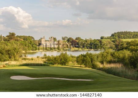 famous 5 star dromoland castle hotel and golf club in ireland. lake set in trees forest and golf  landscape. ireland golf business tourism in county clare, newmarket on fergus