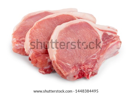 sliced raw pork meat isolated on white background. Top view. Flat lay Royalty-Free Stock Photo #1448384495