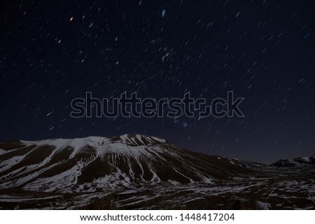 Startrail over Redentore mountain (Sibillini national park - Italy)