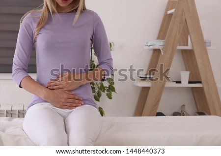 Woman patient waiting at doctor's office. Gynecology, period, female health care, digestive system, Urinary Tract Infections Royalty-Free Stock Photo #1448440373