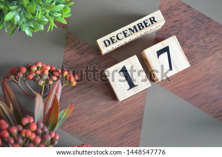 December 17. Date of December month. Diamond wood table for background.