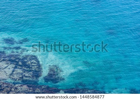 sea picture with clear water with bottom traces